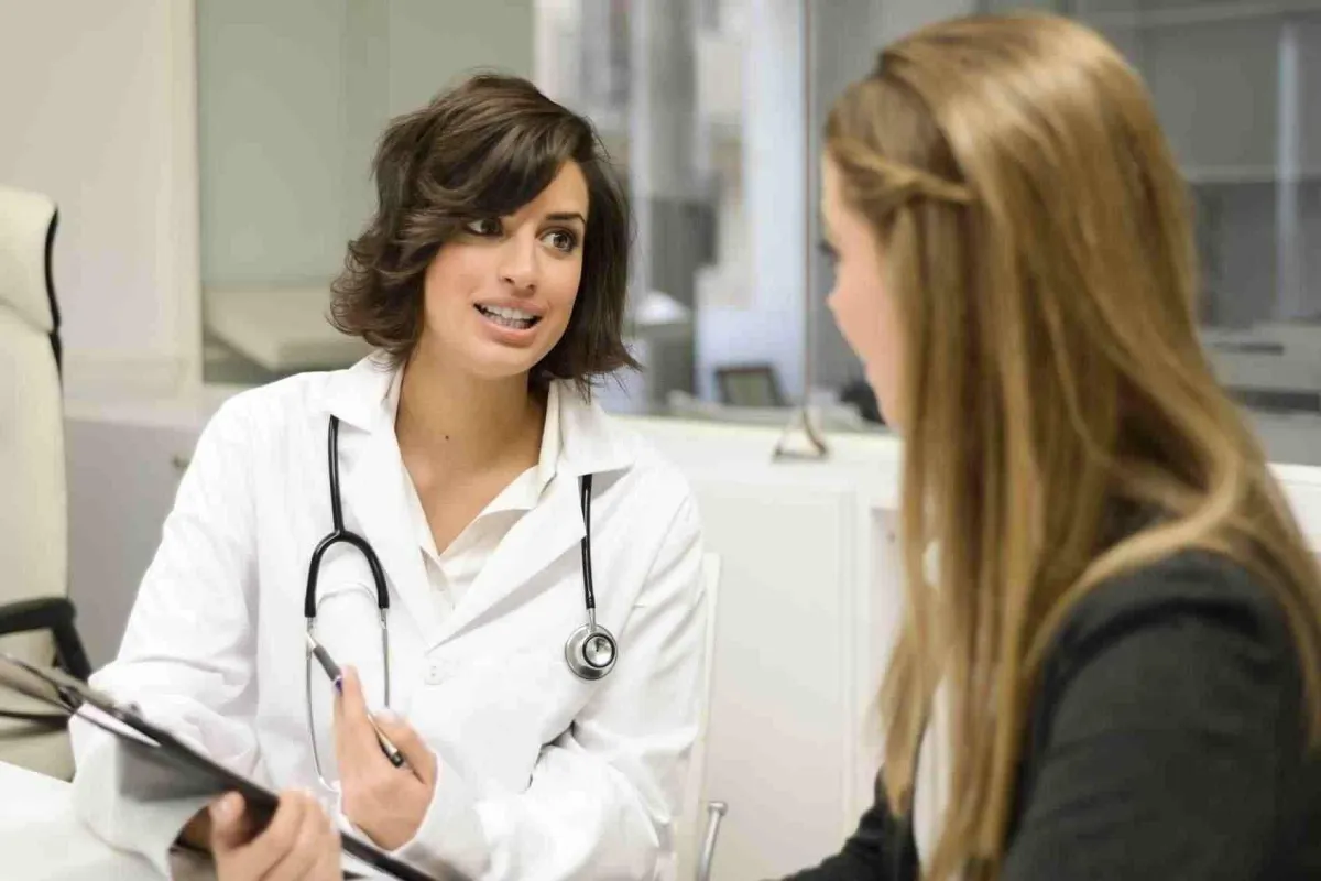 Doctor checking patient during health consultation